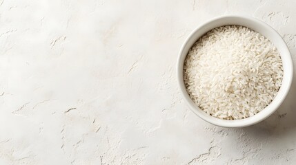 Bowl filled with uncooked long grain white rice