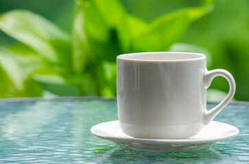 Side view of white cup with customizable space for mockup. Copy space and mockup concept
