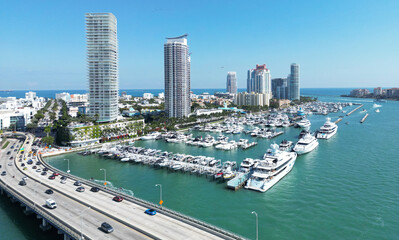 Miami Beach on blue sky. Skyline aerial view. Miami city. Tropical Miami scene. Miami district sky...