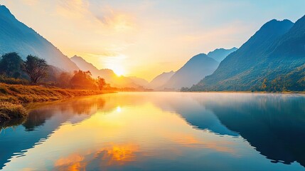 National park scenic landscapes idea. Breathtaking sunrise over tranquil lake with mountains reflecting on the water's surface.