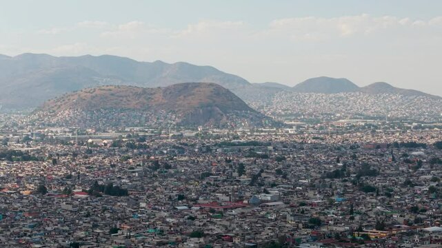 Ecatepec in its hilly area with dense housing, drone view