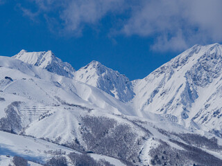 快晴の空と雪の北アルプス　長野県白馬村
