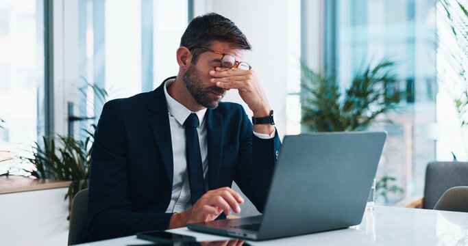Frustrated, businessman or headache with laptop for stress, mistake or corporate bankruptcy at office. Man, employee or accountant with fail or migraine on computer for debt, financial crisis or loss