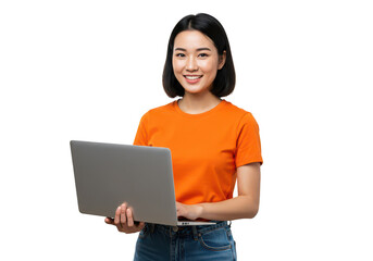 Smiling asian woman in orange shirt holding a laptop against a black background for work or study