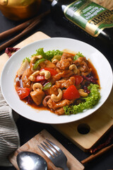 a plate of chicken and vegetable stew