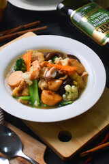 a bowl of chicken and vegetable soup