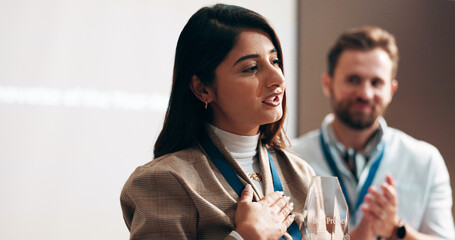 Woman, business or speech with award for trophy, achievement or winning at seminar. Female person, presentation or congratulations with pride for accomplishment, milestone or employee of month
