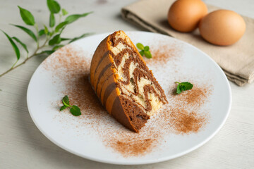 Beautiful and delicious zebra cake decorated with lines of organic chocolate.