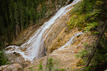 High-angle view of a cascading waterfall in Canmore, Alberta