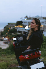 Young woman on motorbike, Bali