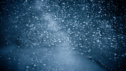 Ice shapes under a lake surface in winter