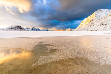 Haukland beach at sunrise in winter, Lofoten Islands