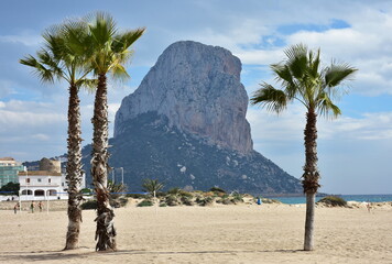 seacoast near village Calp in Spain with Parc natural del Penyal in background