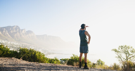 Naklejka premium View, runner and back of man in nature and relax for mockup space, thinking and health. Fitness, workout and reflection with person and training with mountain for sports athlete, scenery or exercise