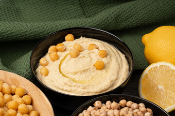 Hummus in bowl, houmous dip, chickpea humus tahini sauce, middle eastern spread