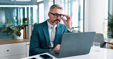 Reading, laptop and business man for finance analysis, budget review and company investment....