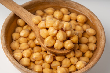Soaked chickpeas, chick pea in water, swollen wet Cicer arietinum fruits, garbanzo beans cooking