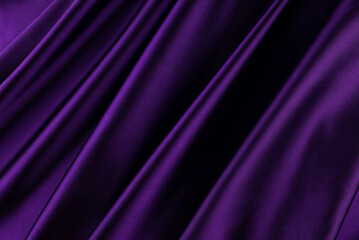 Purple satin background. Soft folds on shiny fabric. Luxurious backdrop with space for design. Flat...