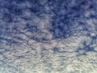 Summer blue sky with clouds. Suitable for wallpaper and website background