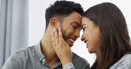 Forehead, embrace and couple with smile, home and romance in living room for man and woman in apartment. Lounge, people and happy for commitment in marriage, love and care for partner in new house