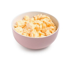 Bowl of tasty scrambled eggs on white background