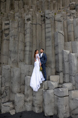 A beautiful couple joyfully celebrates their wedding day, reveling in the love they share against...