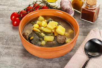 Soup with meatball and potato