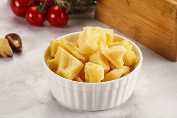 Crushed parmesan cheese in the bowl