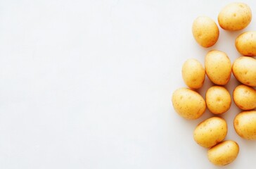 Fototapeta premium Fresh potatoes on a clean white background,