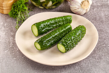 Homemade lighty salted cucumbers with herbs