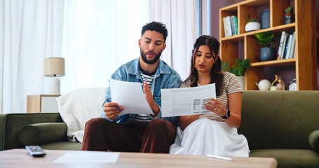 Documents, taxes and couple on sofa for bills, payment receipts and banking in home. Marriage,...