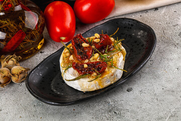 Baked camembert cheese with honey