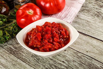 Diced ripe tomato with sauce