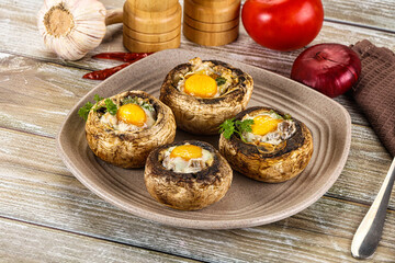 Baked champignon with quail egg