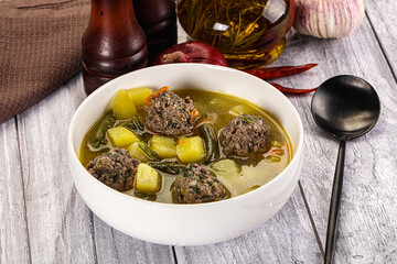 Soup with beef meatballs and vegetables