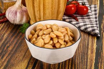 Baked white canned beans in the bowl