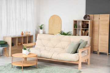 Cute cats on shelves in living room