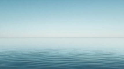 Fototapeta premium Serene Minimalist Seascape: A Tranquil Ocean Under a Pale Blue Sky