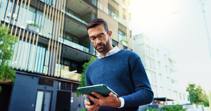 City, businessman and travel with tablet for research, realtor or project for property development. Urban, male person and real estate agent with digital for online review, listing website or commute