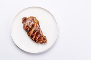A perfectly cooked striploin steak with a juicy, tender texture
