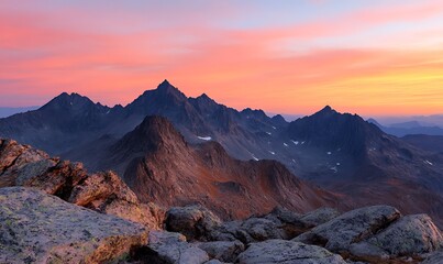 Mountains Peaks Dramatic Sunrise Landscape with Rocks in Foreground Scenery and Colorful Sky