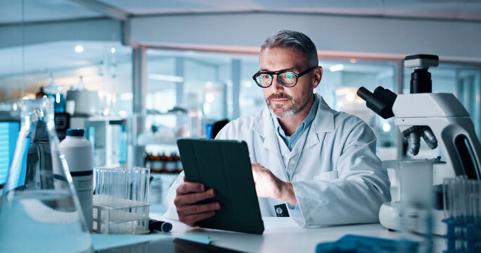 Mature man, science and tablet at lab for medical research with DNA for human genome sequence. Person, touchscreen and clinical trial with app, investigation and review notes for pharmaceutical job