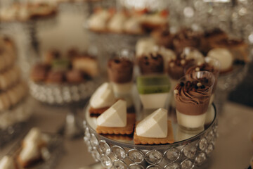 Exquisite Wedding Dessert Table with Elegant Pastries and Delicate Decorations