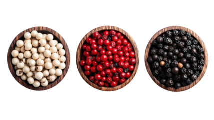 Colorful assortment of pepper varieties displayed in wooden bowls on a white background