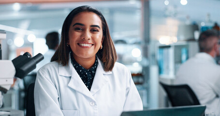 Portrait, science and happy woman in laboratory for medical research, innovation and microbiology on laptop. Scientist, chemist and professional with microscope for healthcare, pharma and confidence