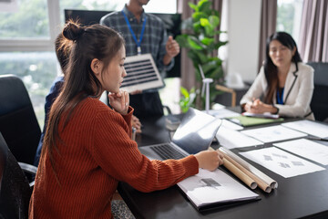 Solar panels green energy Business people working in green eco friendly office business meeting creative ideas for business eco friendly professional teaching corporate people sustainable electricity