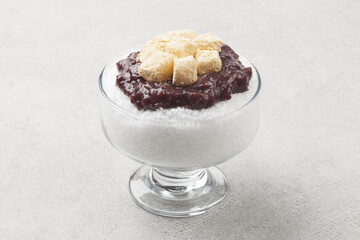  Patbingsu is a food made by crushing ice into small pieces and adding boiled red beans or sugar.