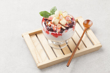  Patbingsu is a food made by crushing ice into small pieces and adding boiled red beans or sugar.