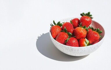 Ripe Red Strawberries in a White Bowl on a Bright Sunny Day