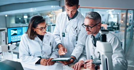 Medical, science and tablet with people in laboratory together for breakthrough or development....